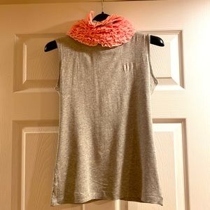 Excellent condition.  Cotton top with detailed pink ruffles around neck